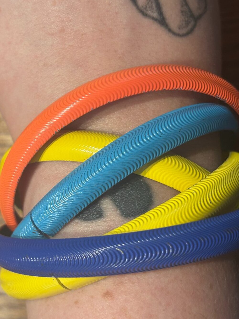 Vintage Metal Yellow, Orange, and Blue Bangle Set